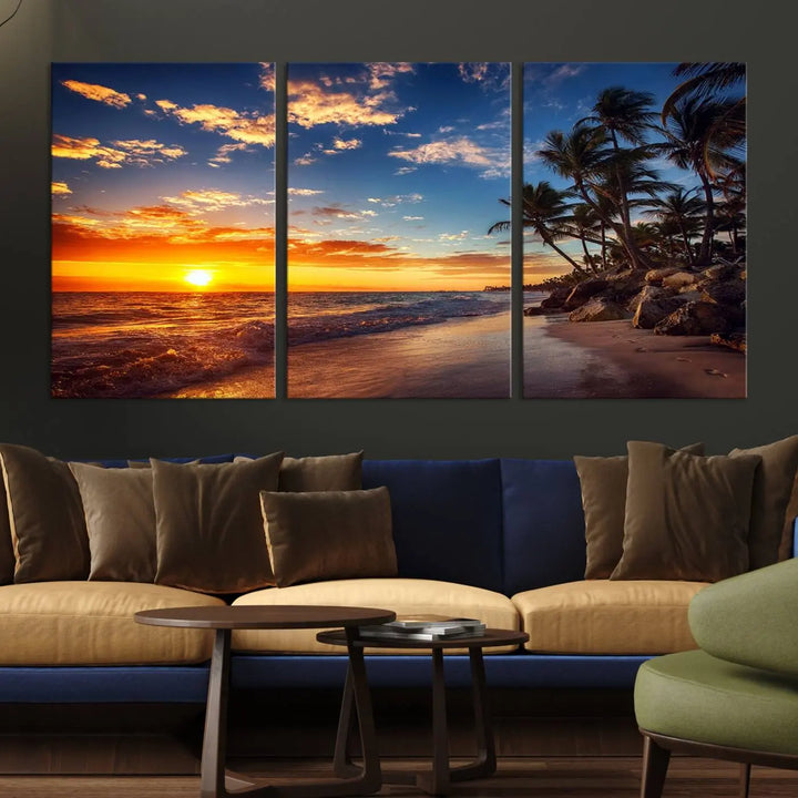 The Tropical Beach Sunset Canvas Art, featuring palm trees and ocean waves, brings an inviting atmosphere to coastal-themed homes.