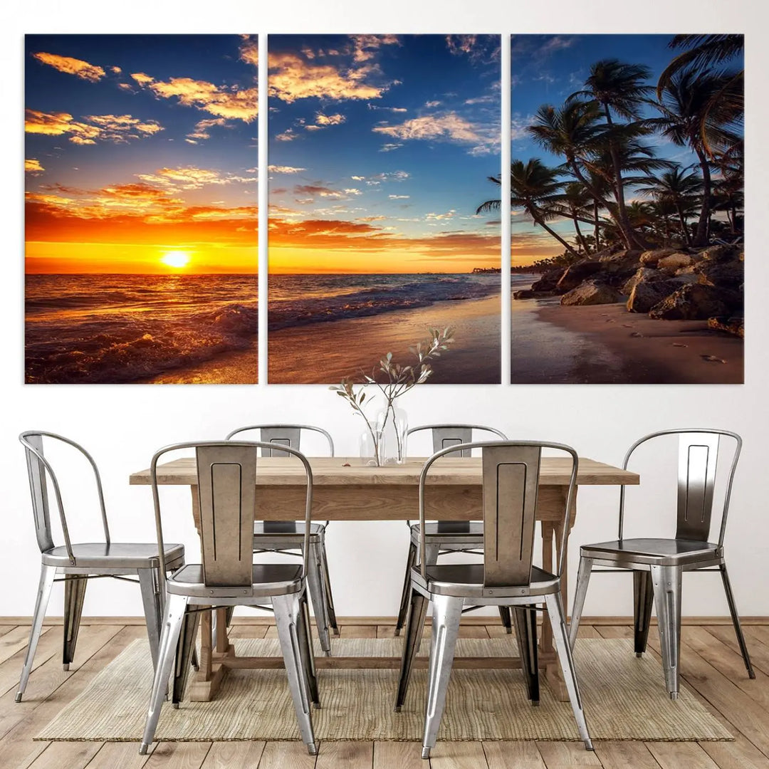 The Tropical Beach Sunset Canvas Art, featuring palm trees and ocean waves, brings an inviting atmosphere to coastal-themed homes.