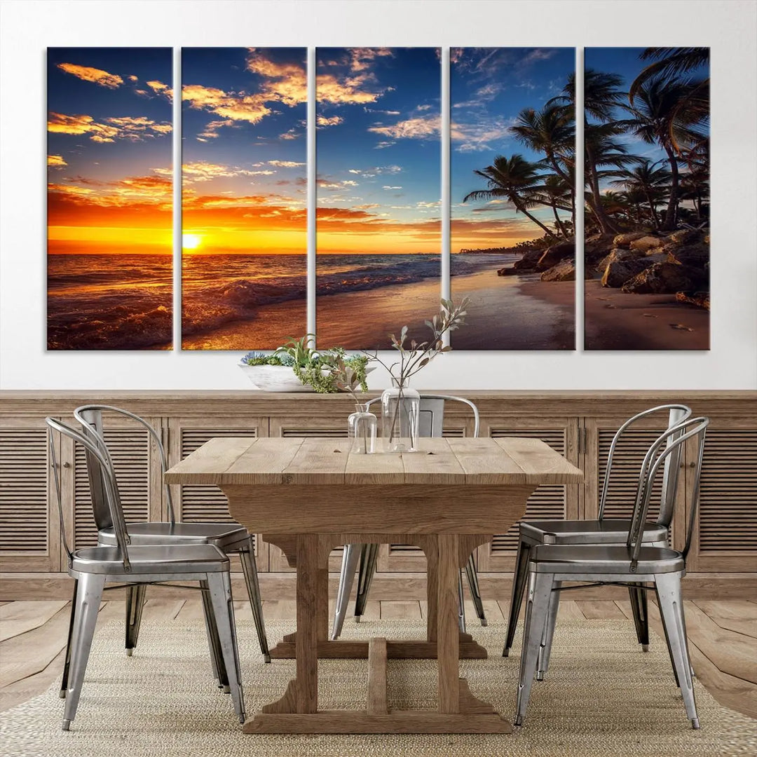 The Tropical Beach Sunset Canvas Art, featuring palm trees and ocean waves, brings an inviting atmosphere to coastal-themed homes.