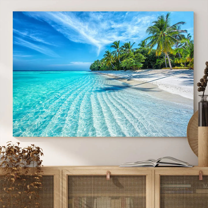 The Tropical Beach Wall Art Canvas Print showcases a serene ocean landscape with crystal clear turquoise water and palm trees, beautifully enhancing the coastal decor.