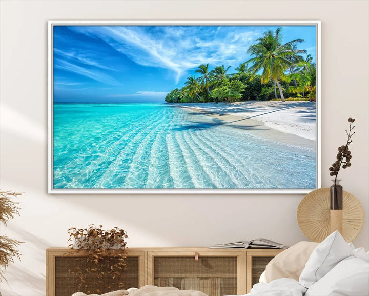 The Tropical Beach Wall Art Canvas Print showcases a serene ocean landscape with crystal clear turquoise water and palm trees, beautifully enhancing the coastal decor.