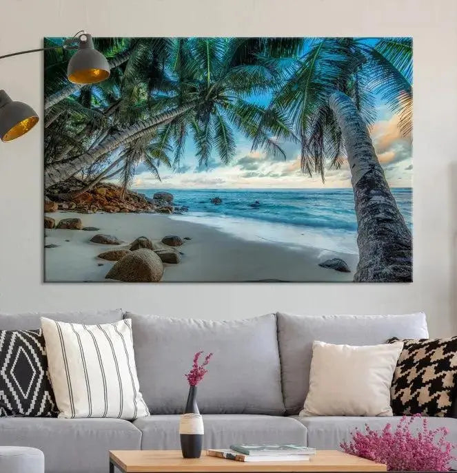 The "Tropical Beach Wall Art Ocean Canvas Print" features palm trees and ocean scenery on museum-quality polycotton canvas. This ready-to-hang piece is perfect for adding a coastal vibe to your space.