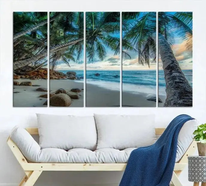 The "Tropical Beach Wall Art Ocean Canvas Print" features palm trees and ocean scenery on museum-quality polycotton canvas. This ready-to-hang piece is perfect for adding a coastal vibe to your space.