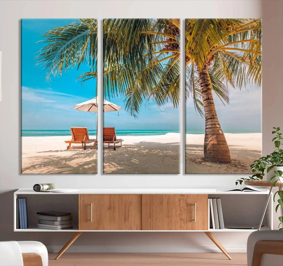 The Tropical Beach Wall Art set features a 3-panel large canvas print with palm trees and sun loungers, creating a serene oasis in your living space.