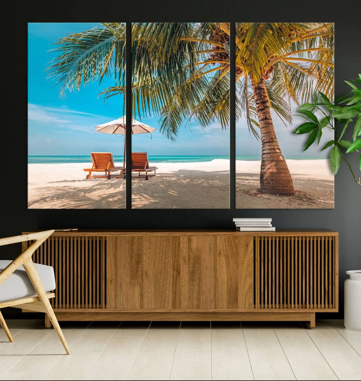 The Tropical Beach Wall Art set features a 3-panel large canvas print with palm trees and sun loungers, creating a serene oasis in your living space.