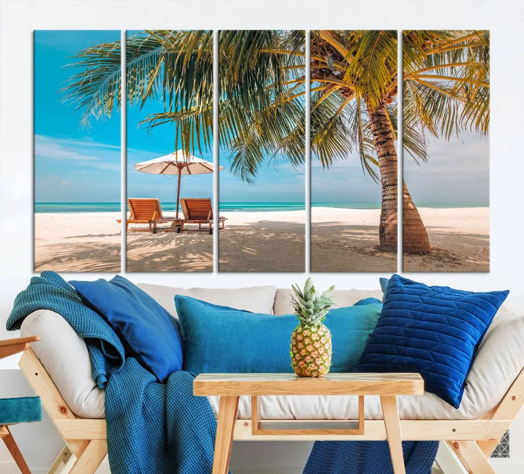 The Tropical Beach Wall Art set features a 3-panel large canvas print with palm trees and sun loungers, creating a serene oasis in your living space.