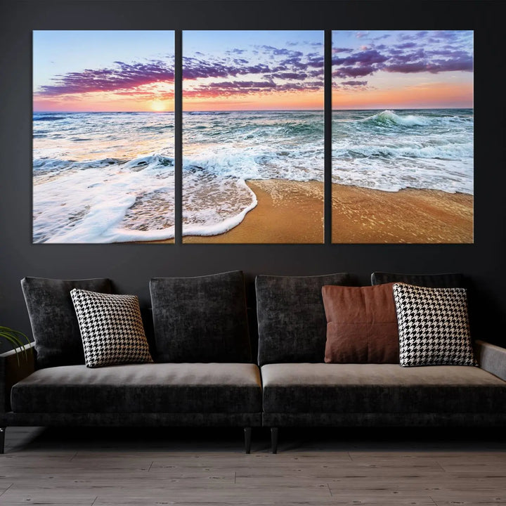 A triptych canvas wall art featuring the Tropical Beach Waves Art Print with a sunset ocean seascape adds striking beauty and perfectly complements the modern living room’s coastal decor.