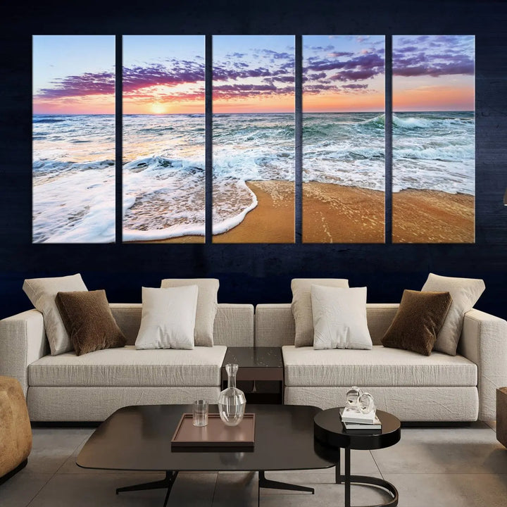 A triptych canvas wall art featuring the Tropical Beach Waves Art Print with a sunset ocean seascape adds striking beauty and perfectly complements the modern living room’s coastal decor.