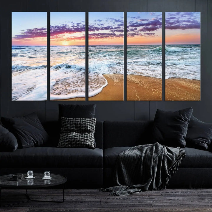 A triptych canvas wall art featuring the Tropical Beach Waves Art Print with a sunset ocean seascape adds striking beauty and perfectly complements the modern living room’s coastal decor.