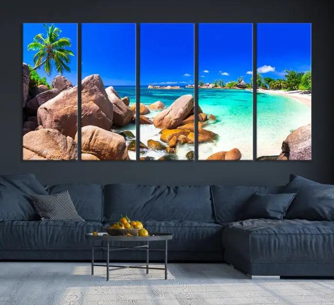 Experience a vibrant escape with the Tropical Beach and Island Wall Art Canvas Print, featuring a triptych of a tropical beach scene complete with rocks, palm trees, and turquoise water. Crafted on museum-quality canvases for an exquisite touch, each piece is gallery wrapped to ensure seamless display and lasting beauty.