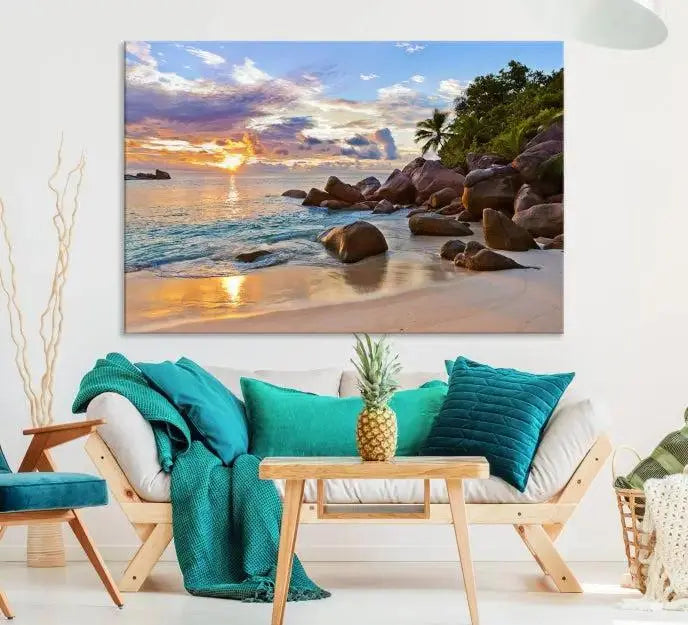 In a cozy living room, the "Tropical Island Beach Sunset Canvas Print," crafted on museum-quality canvas, hangs on the wall.