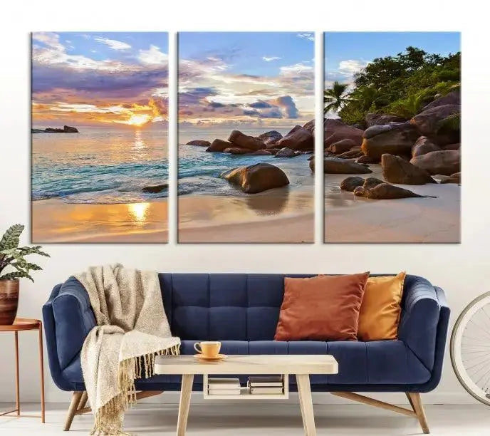 In a cozy living room, the "Tropical Island Beach Sunset Canvas Print," crafted on museum-quality canvas, hangs on the wall.