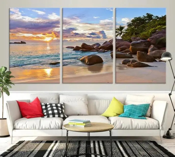 In a cozy living room, the "Tropical Island Beach Sunset Canvas Print," crafted on museum-quality canvas, hangs on the wall.