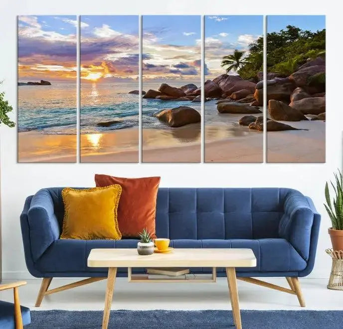 In a cozy living room, the "Tropical Island Beach Sunset Canvas Print," crafted on museum-quality canvas, hangs on the wall.