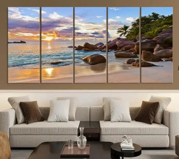 In a cozy living room, the "Tropical Island Beach Sunset Canvas Print," crafted on museum-quality canvas, hangs on the wall.