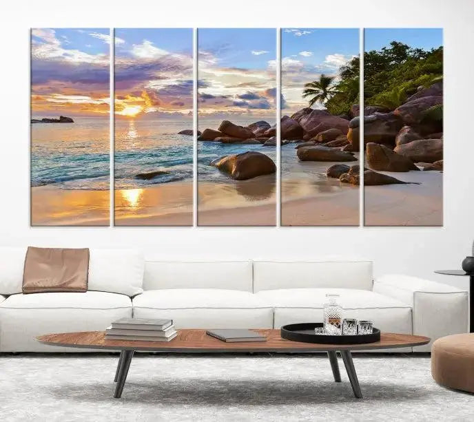 In a cozy living room, the "Tropical Island Beach Sunset Canvas Print," crafted on museum-quality canvas, hangs on the wall.