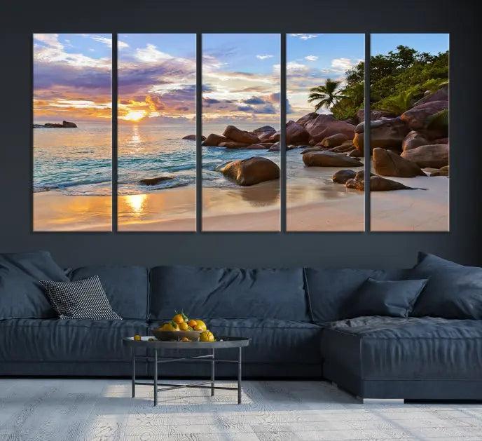 In a cozy living room, the "Tropical Island Beach Sunset Canvas Print," crafted on museum-quality canvas, hangs on the wall.