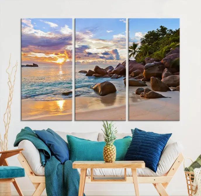 In a cozy living room, the "Tropical Island Beach Sunset Canvas Print," crafted on museum-quality canvas, hangs on the wall.