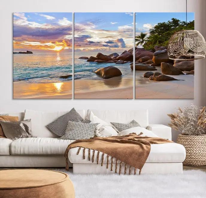 In a cozy living room, the "Tropical Island Beach Sunset Canvas Print," crafted on museum-quality canvas, hangs on the wall.