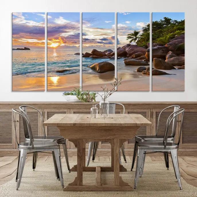 In a cozy living room, the "Tropical Island Beach Sunset Canvas Print," crafted on museum-quality canvas, hangs on the wall.