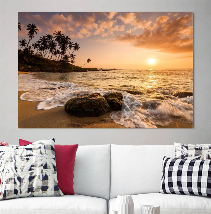 The "Tropical Island Sunset Sunrise Wall Art Canvas Print" is a stunning triptych that showcases a tranquil beach sunset complete with waves and palm trees. Each canvas piece is meticulously hand-assembled and framed using museum-quality polycotton with a UV-protective coating to ensure enduring beauty.