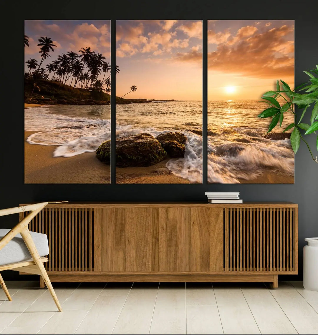 The "Tropical Island Sunset Sunrise Wall Art Canvas Print" is a stunning triptych that showcases a tranquil beach sunset complete with waves and palm trees. Each canvas piece is meticulously hand-assembled and framed using museum-quality polycotton with a UV-protective coating to ensure enduring beauty.