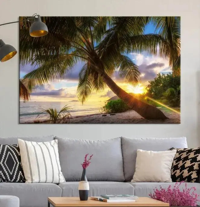 The Tropical Island Sunset on the Beach Palms Wall Art Canvas Print, featuring a gallery-wrapped finish, adds a stunning visual element to the space.