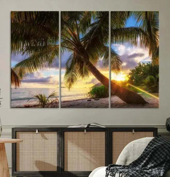 The Tropical Island Sunset on the Beach Palms Wall Art Canvas Print, featuring a gallery-wrapped finish, adds a stunning visual element to the space.