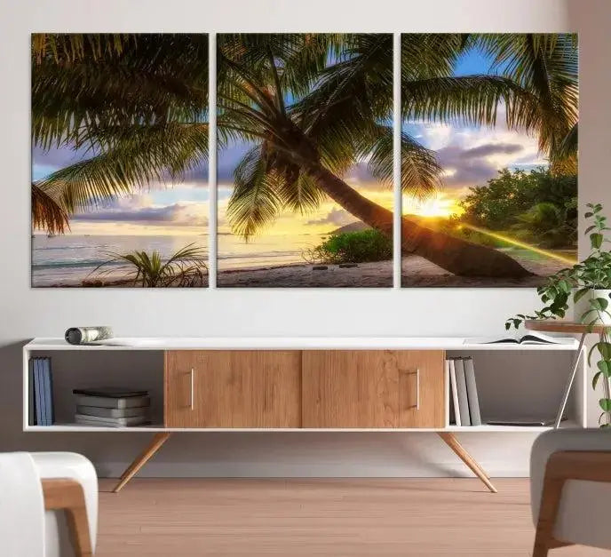 The Tropical Island Sunset on the Beach Palms Wall Art Canvas Print, featuring a gallery-wrapped finish, adds a stunning visual element to the space.