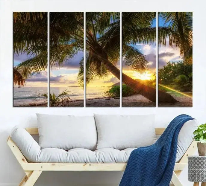 The Tropical Island Sunset on the Beach Palms Wall Art Canvas Print, featuring a gallery-wrapped finish, adds a stunning visual element to the space.