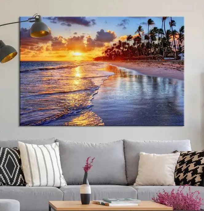 The Tropical Sunset Beach Canvas Wall Art – Coastal Triptych Landscape Print enhances the contemporary living room.