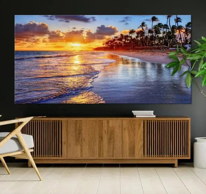 The Tropical Sunset Beach Canvas Wall Art – Coastal Triptych Landscape Print enhances the contemporary living room.