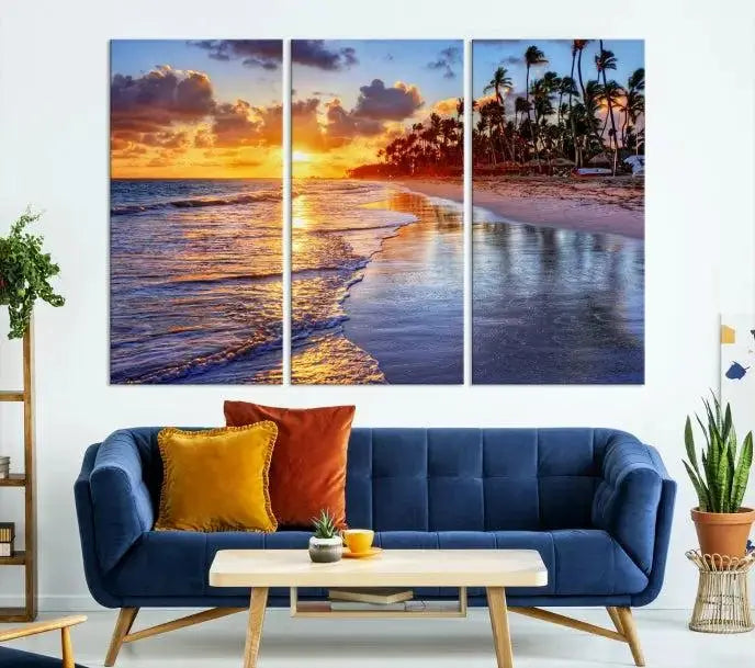 The Tropical Sunset Beach Canvas Wall Art – Coastal Triptych Landscape Print enhances the contemporary living room.