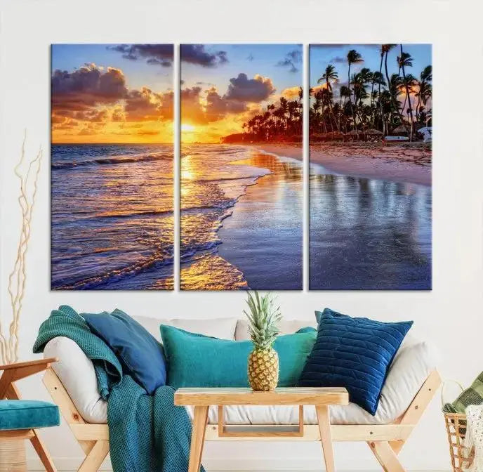 The Tropical Sunset Beach Canvas Wall Art – Coastal Triptych Landscape Print enhances the contemporary living room.