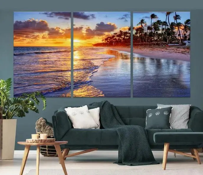 The Tropical Sunset Beach Canvas Wall Art – Coastal Triptych Landscape Print enhances the contemporary living room.