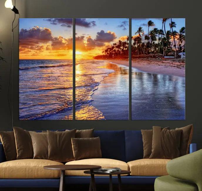 The Tropical Sunset Beach Canvas Wall Art – Coastal Triptych Landscape Print enhances the contemporary living room.