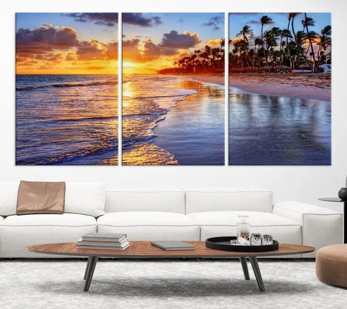 The Tropical Sunset Beach Canvas Wall Art – Coastal Triptych Landscape Print enhances the contemporary living room.