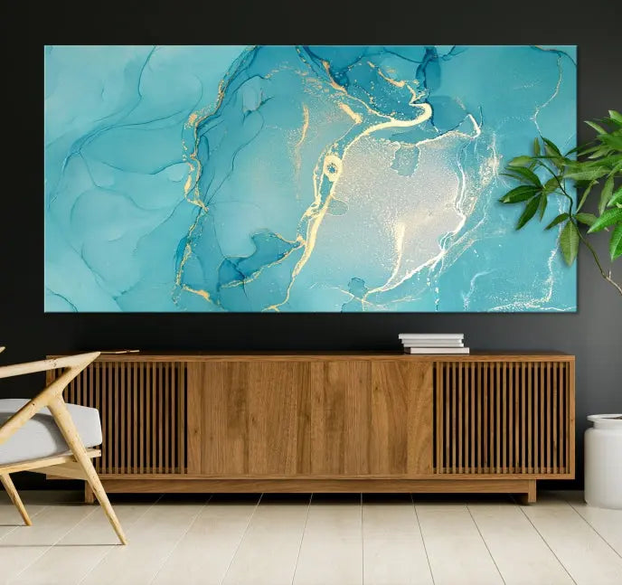 The Turquoise Canvas Wall Art Abstract Print, crafted with museum-quality canvases and a UV-protective coating, graces the wall. This striking piece arrives ready to hang and infuses the space with elegance.