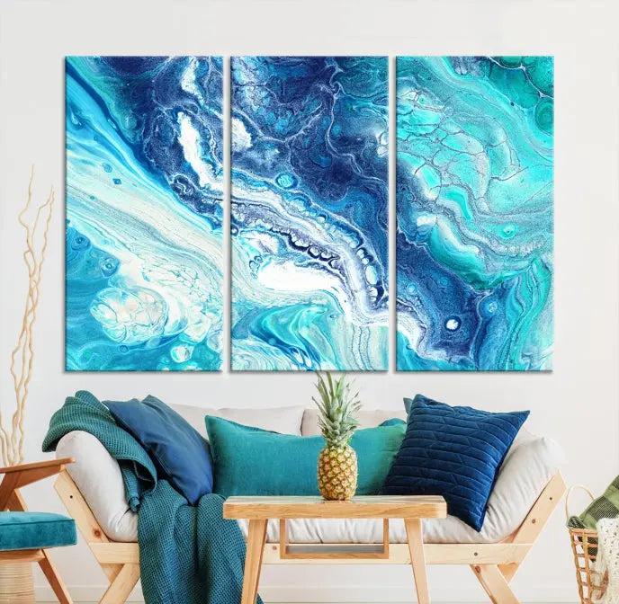 The "Turquoise Marble Fluid Effect Wall Art Abstract Canvas Wall Art Print" enhances the space with its captivating design.