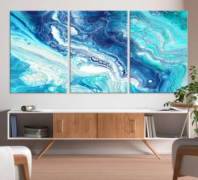 The "Turquoise Marble Fluid Effect Wall Art Abstract Canvas Wall Art Print" enhances the space with its captivating design.