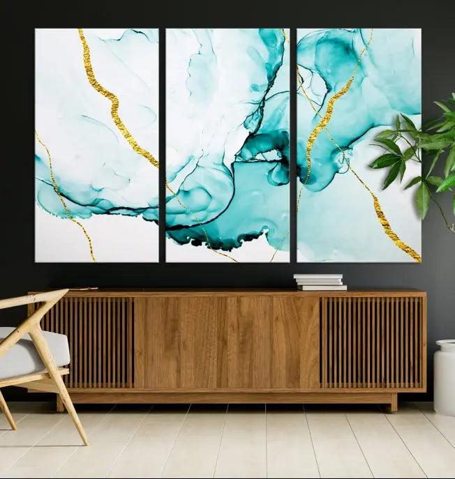 The Turquoise Marble Fluid Effect Wall Art Abstract Canvas Print adds a touch of elegance to the room. This museum-quality canvas comes ready to hang, offering an effortlessly stylish accent to the space.