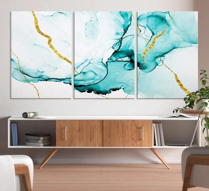 The Turquoise Marble Fluid Effect Wall Art Abstract Canvas Print adds a touch of elegance to the room. This museum-quality canvas comes ready to hang, offering an effortlessly stylish accent to the space.