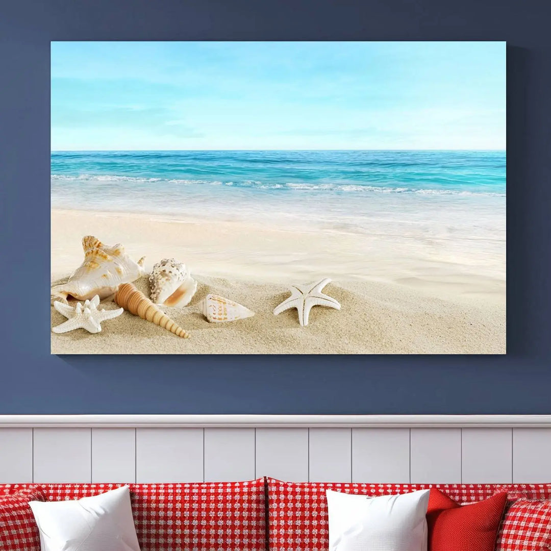 The "Turquoise Ocean View Seashell Starfish on the Beach Canvas Print Artwork" is a triptych piece that showcases a tranquil beach scene, complete with seashells and starfish adorning the sand. It is elegantly gallery-wrapped on museum-quality canvas.