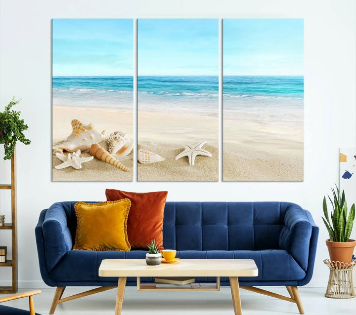 The "Turquoise Ocean View Seashell Starfish on the Beach Canvas Print Artwork" is a triptych piece that showcases a tranquil beach scene, complete with seashells and starfish adorning the sand. It is elegantly gallery-wrapped on museum-quality canvas.