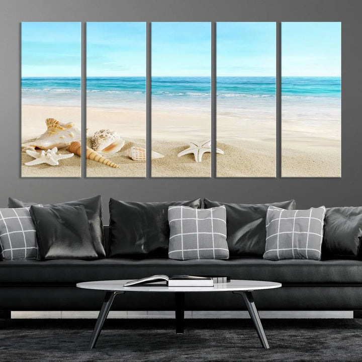 The "Turquoise Ocean View Seashell Starfish on the Beach Canvas Print Artwork" is a triptych piece that showcases a tranquil beach scene, complete with seashells and starfish adorning the sand. It is elegantly gallery-wrapped on museum-quality canvas.