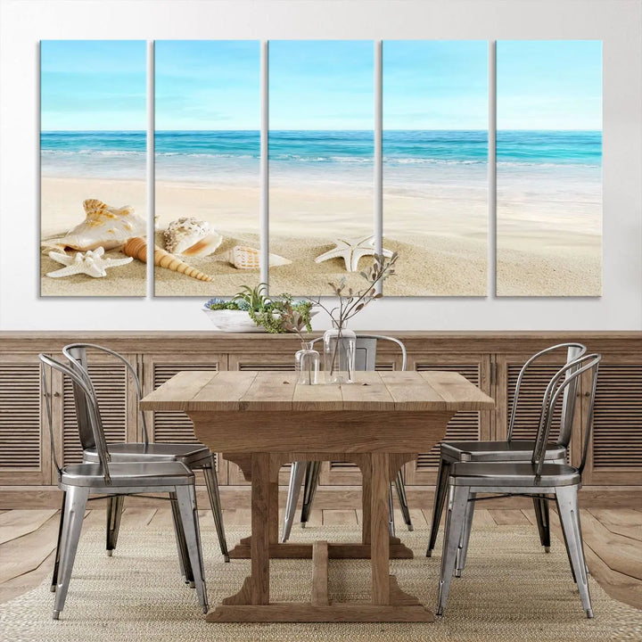 The "Turquoise Ocean View Seashell Starfish on the Beach Canvas Print Artwork" is a triptych piece that showcases a tranquil beach scene, complete with seashells and starfish adorning the sand. It is elegantly gallery-wrapped on museum-quality canvas.