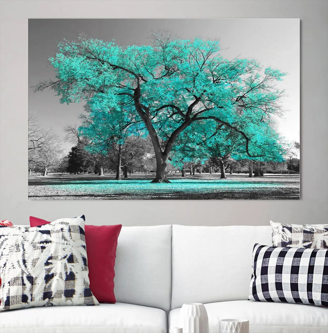 The "Turquoise Tree Canvas Wall Art Multi Piece Canvas Print" features a stunning triptych of a tree with turquoise leaves, printed on museum-quality canvas and coated for UV protection. The artwork arrives ready to hang, instantly enhancing the charm of your space.