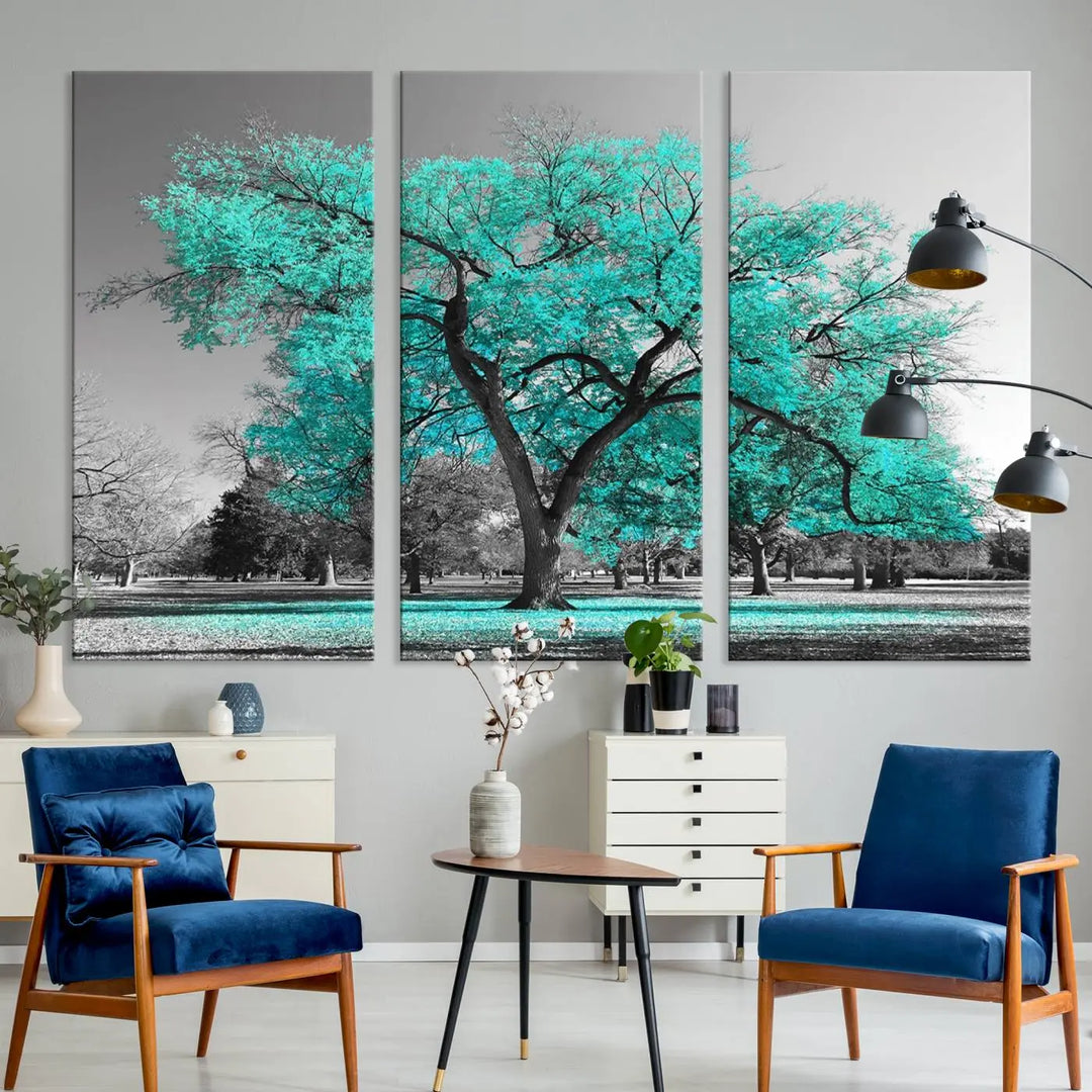 The "Turquoise Tree Canvas Wall Art Multi Piece Canvas Print" features a stunning triptych of a tree with turquoise leaves, printed on museum-quality canvas and coated for UV protection. The artwork arrives ready to hang, instantly enhancing the charm of your space.