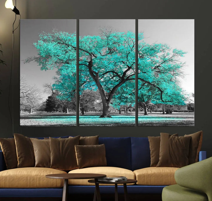 The "Turquoise Tree Canvas Wall Art Multi Piece Canvas Print" features a stunning triptych of a tree with turquoise leaves, printed on museum-quality canvas and coated for UV protection. The artwork arrives ready to hang, instantly enhancing the charm of your space.