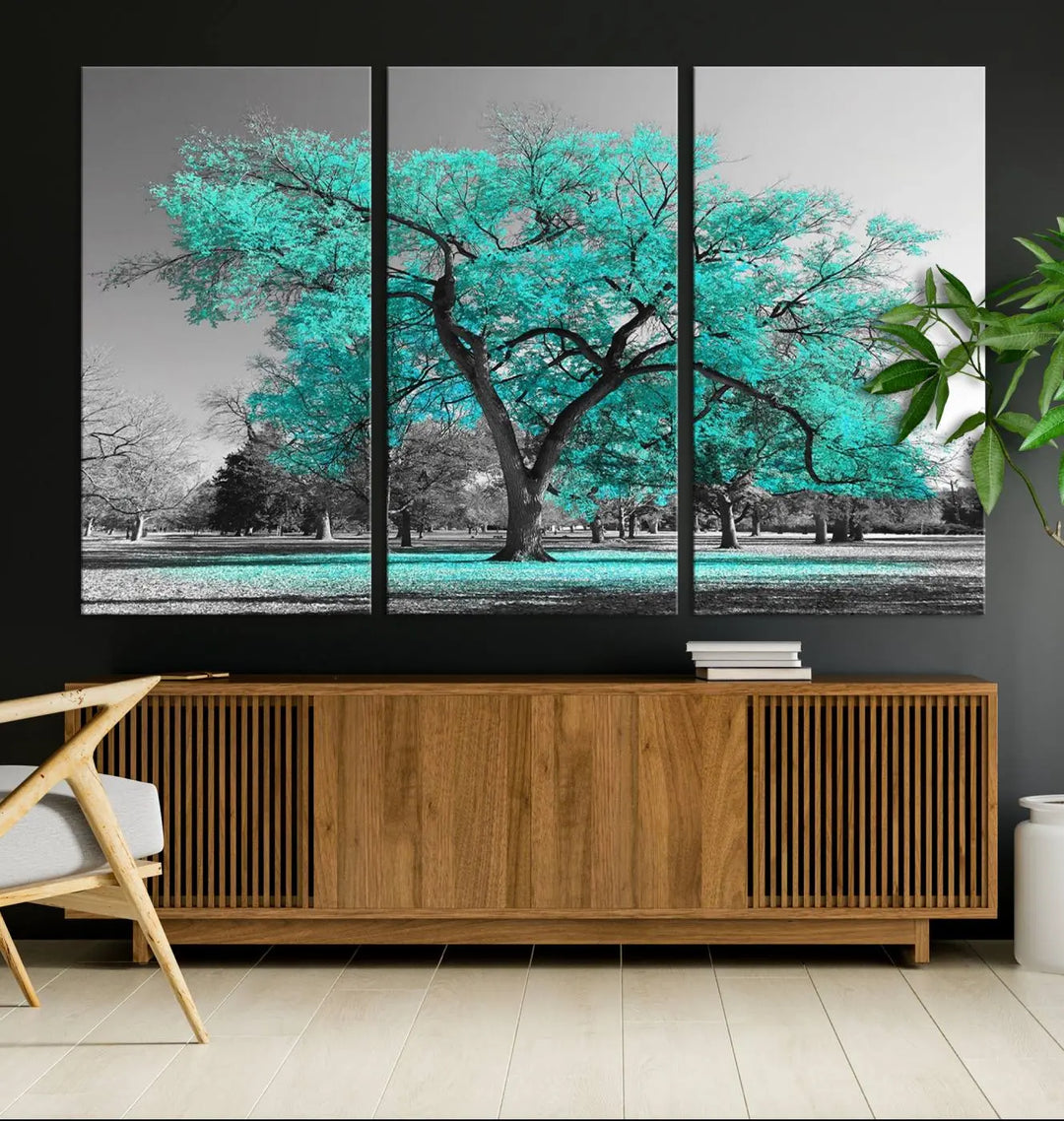 The "Turquoise Tree Canvas Wall Art Multi Piece Canvas Print" features a stunning triptych of a tree with turquoise leaves, printed on museum-quality canvas and coated for UV protection. The artwork arrives ready to hang, instantly enhancing the charm of your space.